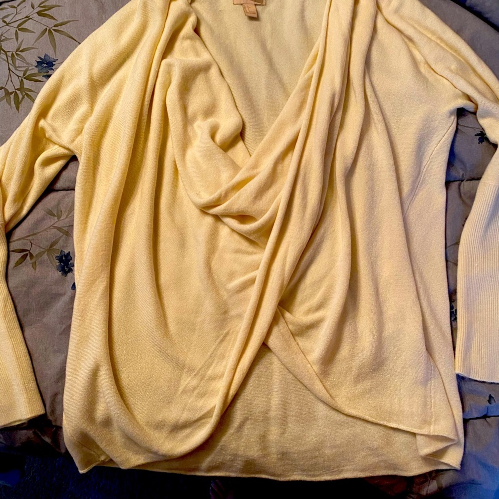 A soft cotton criss cross light sweater